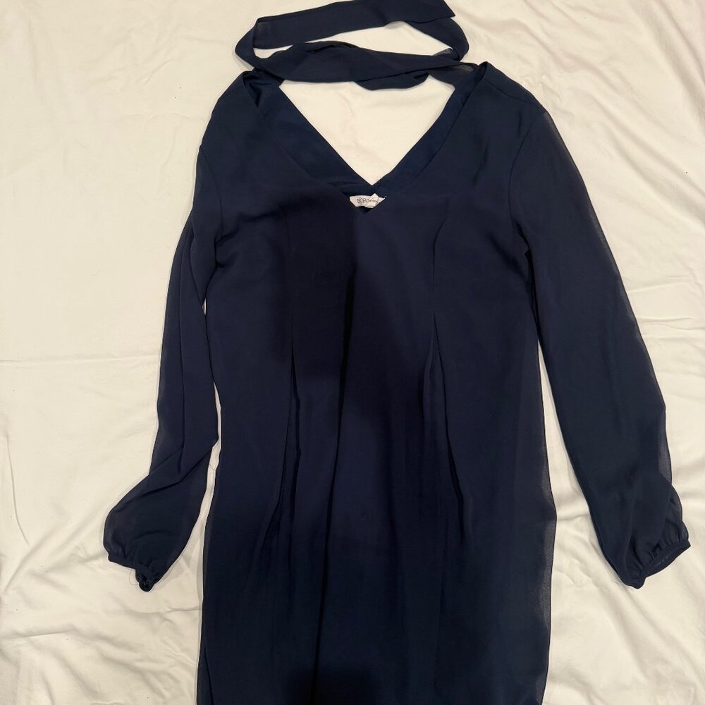 BCBGeneration navy blue dress with sheer long sleeves and tie behind neck